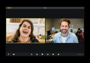 Image of a man and a woman participating in a virtual one-on-one
